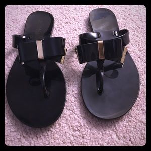 Michael Kors flip flops. Worn once.