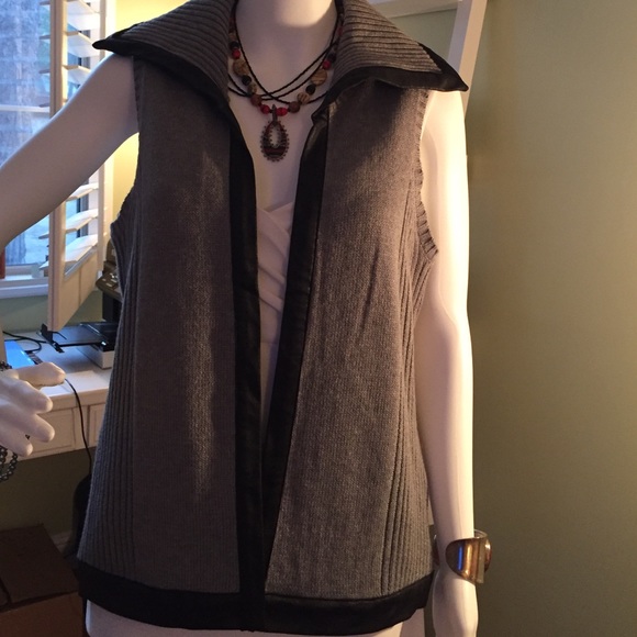 Grey sweater vest with faux leather trim