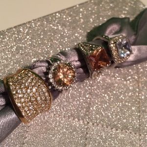 4 costume rings, size 7/8