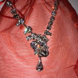 Adjustable crystal necklace with cluster detail.