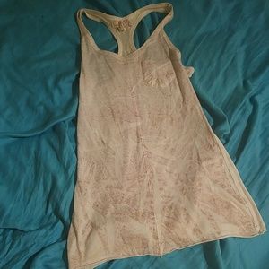 Very light pink and gold Op tank top