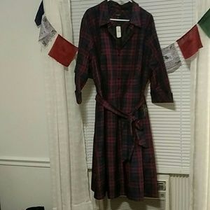 Midi length dress with 3/4 length sleeves.