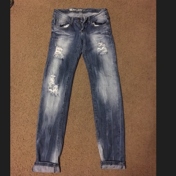 Distressed denim jeans