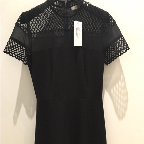 Sandro Dresses & Skirts - Black Sandro dress with short sleeves and collar.