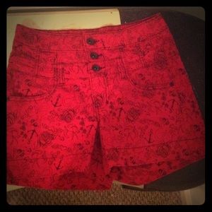 Red high waisted shorts with design