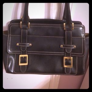 Black handbag with buckles