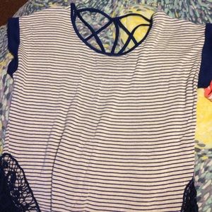 Blue and white shirt.