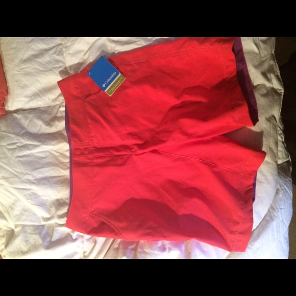 Bright pink surfer shorts