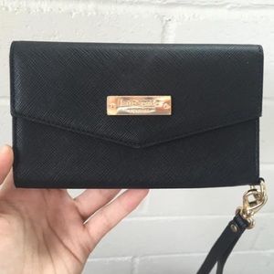 Kate spade iPhone 6 wallet case.
