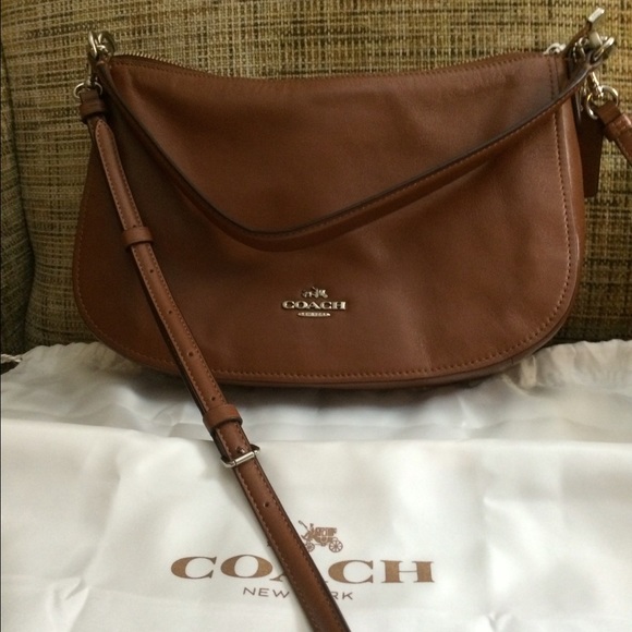 Brown leather Coach bag. NWOT. Perfect condition.
