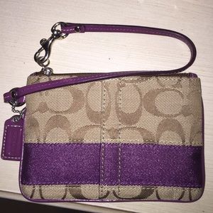 Coach wristlet purple and gold with leather strap