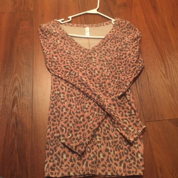 Pink v neck snow leopard top