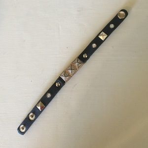Faux leather studded bracelet.