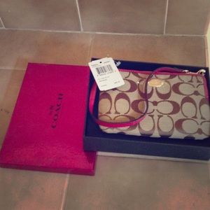 New coach wristlets in box with tags!