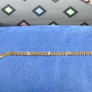 Gold with hook bracelet.