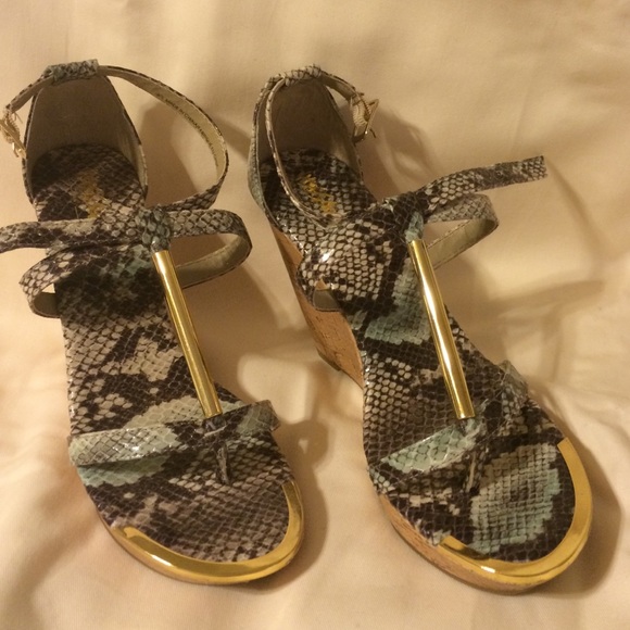 Brand new snake print wedges. Mossimo brand.
