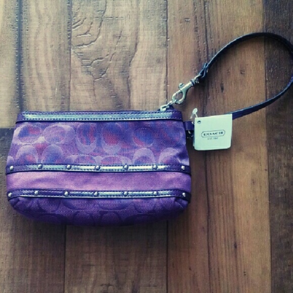 Coach Handbags - Never used Coach wrist bag.