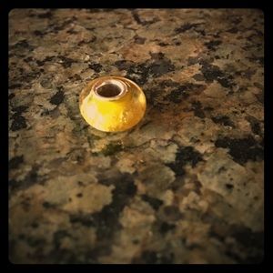 Yellow metallic bead
