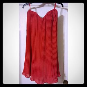 Red flirty party dress.