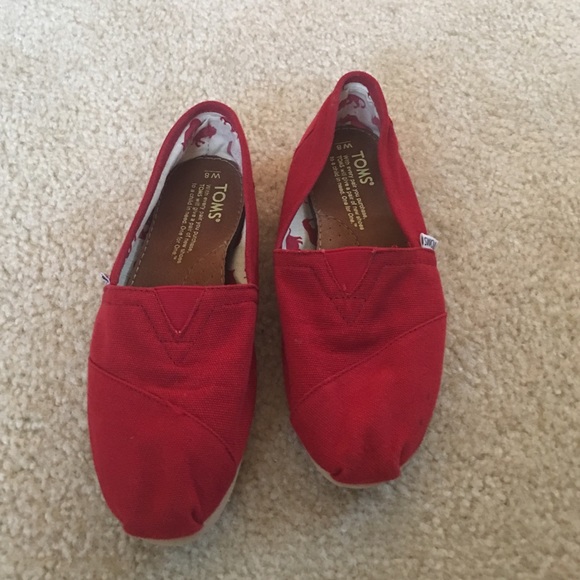 TOMS Red Slip-Ons Size 8.  Great condition!!