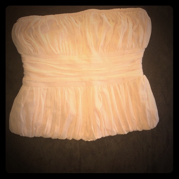 Sleeveless pink ruched top