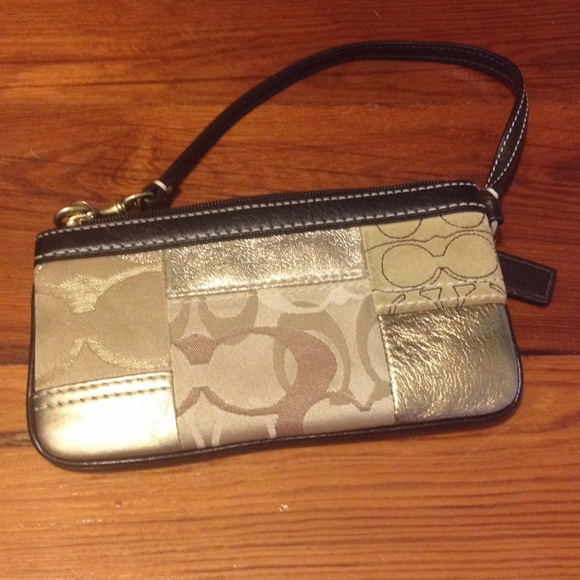 Signature patchwork gold coach wristlet like new