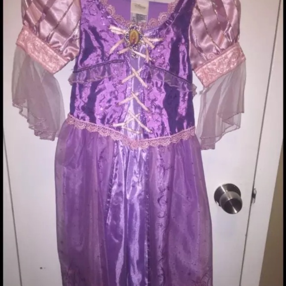 Disney's Rapunzel dress, jewels, and wig.