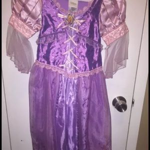 Disney's Rapunzel dress, jewels, and wig.