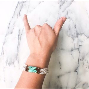 Ecru,Turquoise, and Bronze seed bead bracelet.