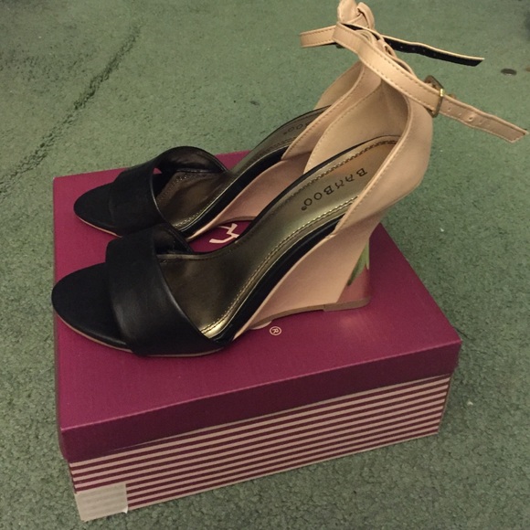 Bamboo shoes. Black and tan wedged heels.