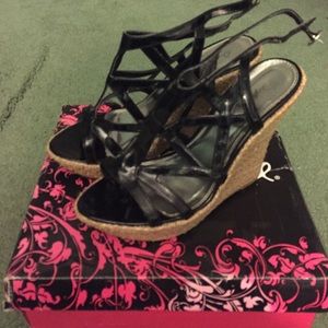 Black sandal wedges.