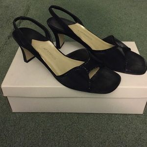 Heeled sandals.