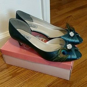 Never worn teal kitten heels with crystals