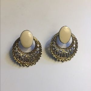 Gold, white statement stud earrings