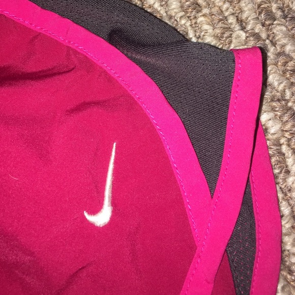 Red and Pink Nike shorts with black on the sides. - Picture 2 of 4