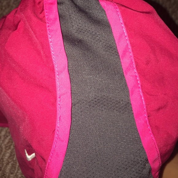 Red and Pink Nike shorts with black on the sides. - Picture 3 of 4