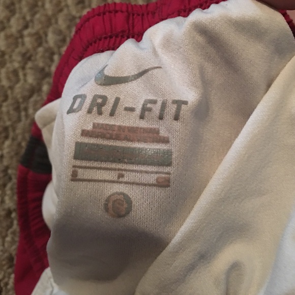 Red and Pink Nike shorts with black on the sides. - Picture 4 of 4