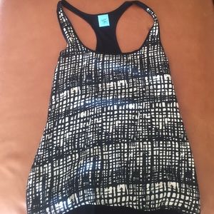 cream and black patterned tank top