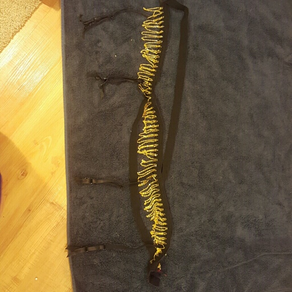 Gold tassle garter belt.