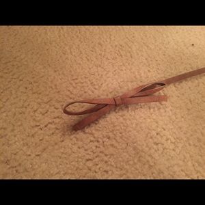 Brown bow belt