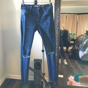 Dark blue ripped jeans