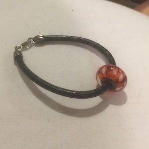 Pandora black bracket with red bead