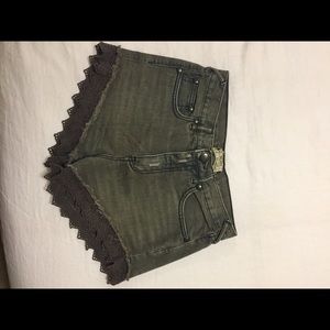 Free People gray denim shorts with lace detail