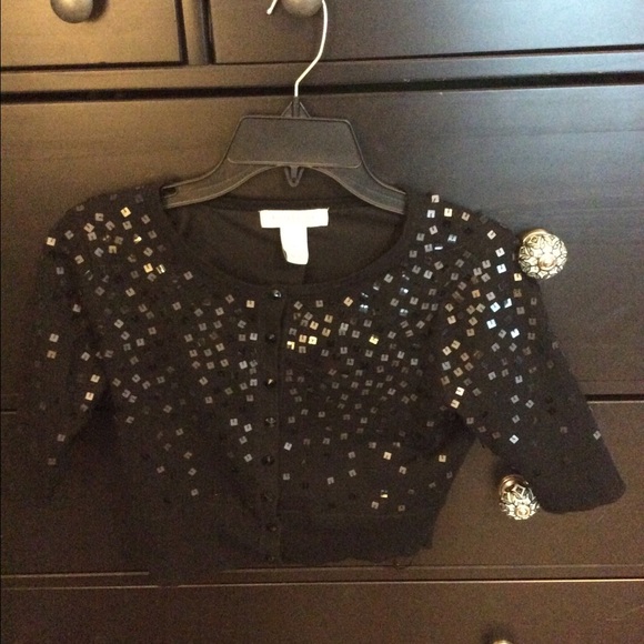 Great black sequined bolero style sweater.