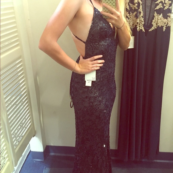BACKLESS NAVY SCALA BEADED GOWN