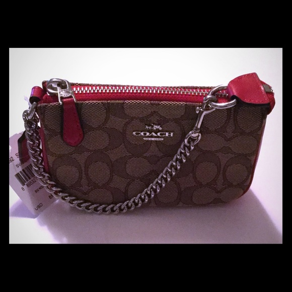 (SOLD) Coach Signature Nolita 15 Wristlet