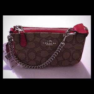 (SOLD) Coach Signature Nolita 15 Wristlet