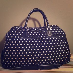Really cute Polk a dot duffle bag!