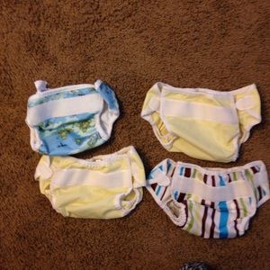 4 cloth diaper covers. Great condition.