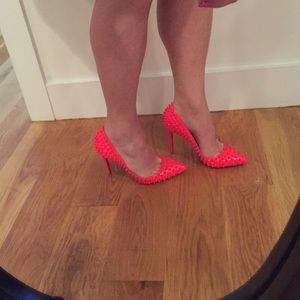 Christian Louboutin hot pink spiked pumps